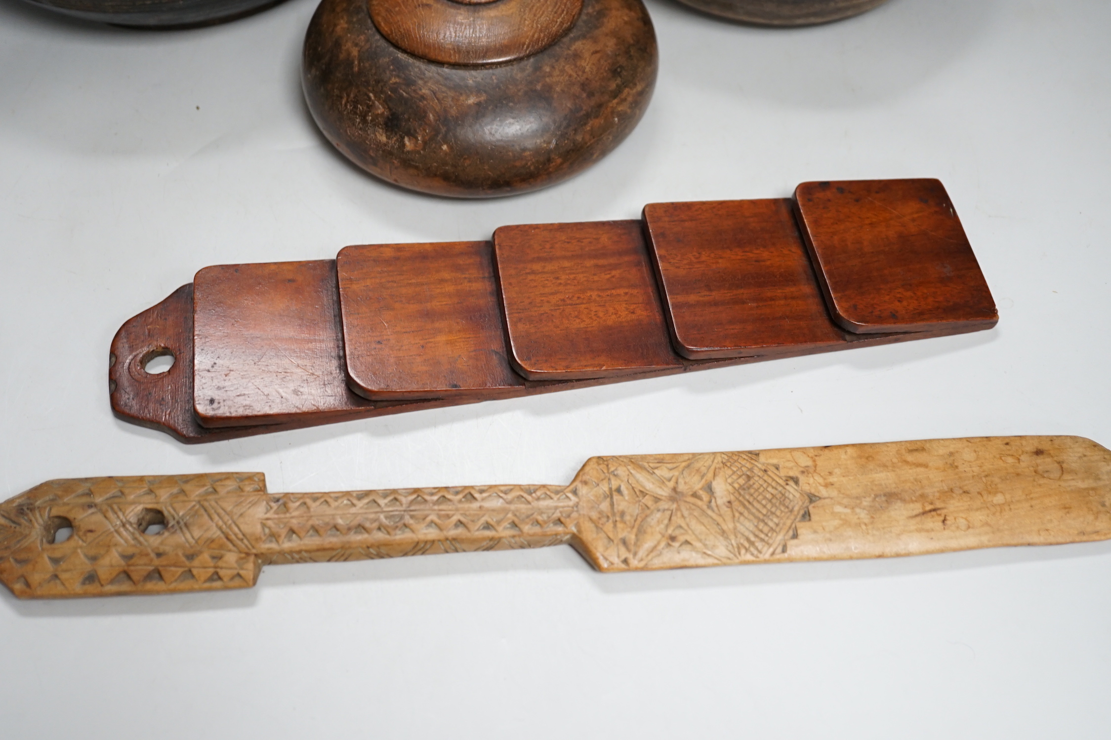 A group of treen, including chip-carved love token, 35cm (9)